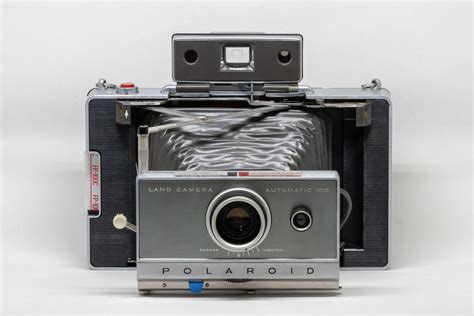 (395) $ 33. . Polaroid automatic 100 land camera